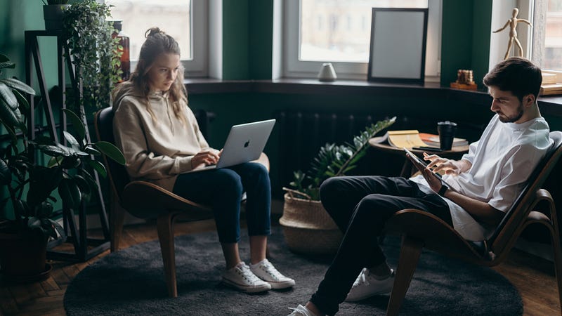 Photo by cottonbro studio: https://www.pexels.com/photo/photo-of-two-people-using-their-gadgets-4065137/